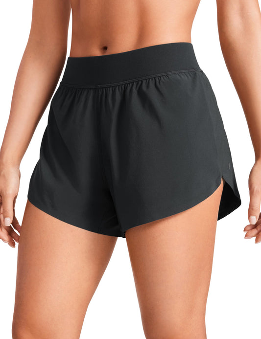 CRZ YOGA Mid Waisted Dolphin Athletic Shorts for Women Lightweight High Split Gym Workout Shorts with Liner Quick Dry